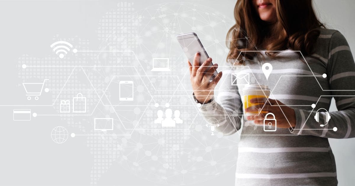 a woman holding a smart phone in front of a white background with omnichannel marketing apps emerging from the phone