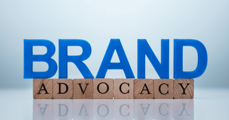 advocacy written with scrabble tiles with brand written in blue over it