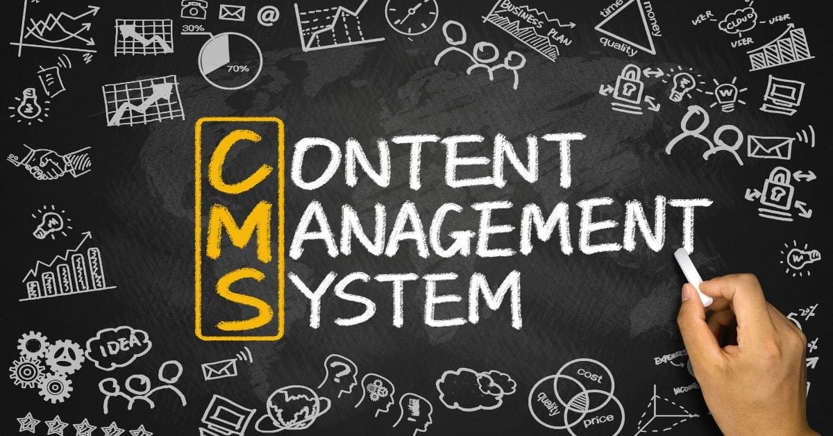 a board with the words CMS in yellow and content management system in white chalk, and other graphs and elements drawn