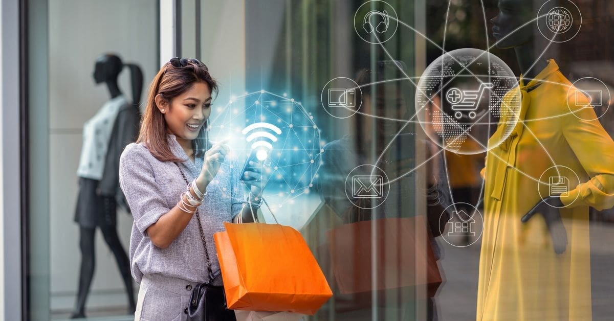 a woman using a smart phone with multiple apps in front of a store window